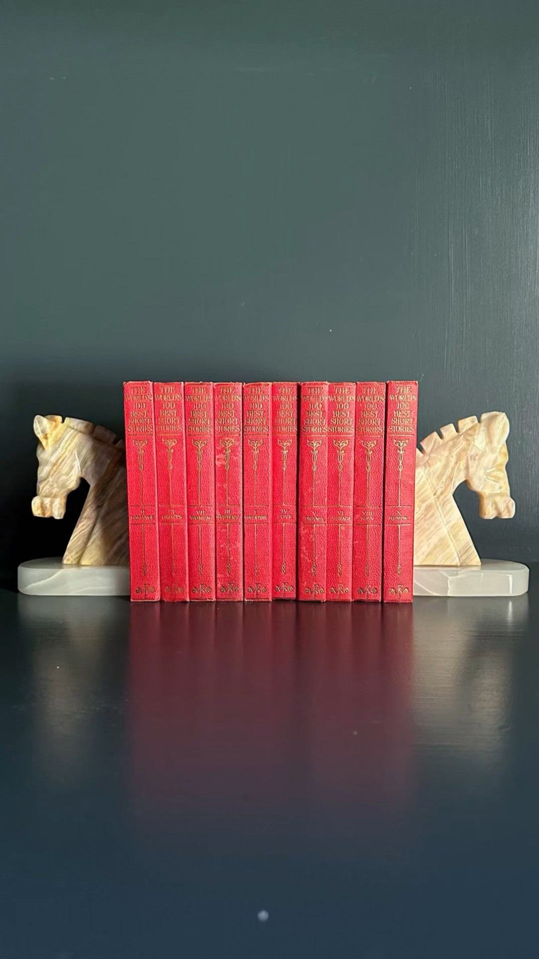My most recent estate sale find is these onyx horse head bookends. I love how they pop against the dark backdrop and these #vintage red leather books. I’ve said it before and I’ll say it again: there’s nothing like a vintage accent to make your #homedecor have interest and character. 🐎

#LTKStyleTip #LTKVideo #LTKHome