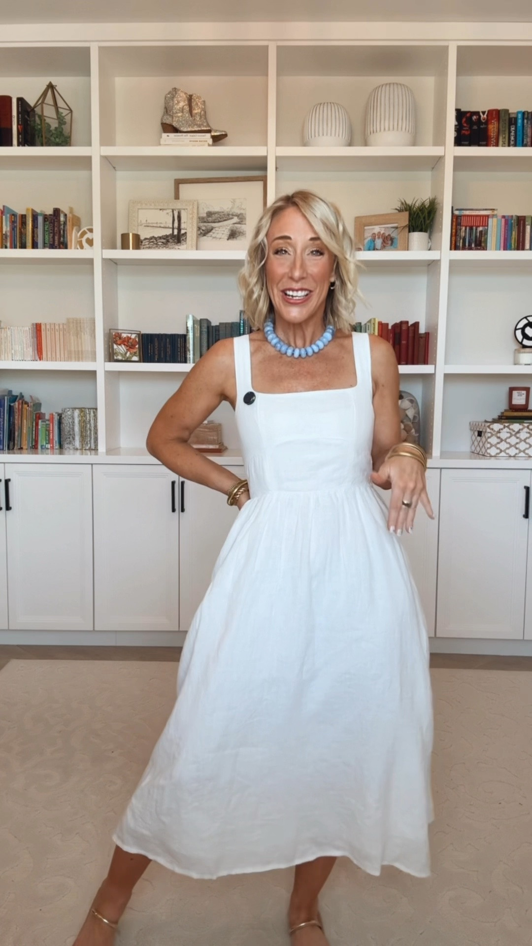 This white linen midi dress is perfection! I can’t wait to take it to Italy … and then wear it all summer! Wearing a size XS. 
(And the 2nd item is a lightweight poncho/shawl to take for wearing into churches).
@Quince