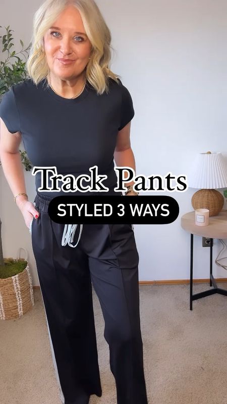 Track Pants 🖤Styled 3 ways!   👉🏻Comment LINK to shop!  Make sure you grab the *exclusive* CODE in the  @shop.ltk app! 

Take those comfy track pants up a notch and dress them up!  I love take a really casual piece and giving it an elevation!  
🛍️
TO SHOP:
1️⃣ Comment LINK and I’ll send you a DM (direct message) with the links! 
2️⃣ Find the links in my stories for 24 hours
3️⃣ Follow me PARTYTILDAWN in the @shop.LTK app
4️⃣ Click the link in my bio, and click “SHOP MY LOOKS” and you’ll find it all! 

#ltkspringsale #ltkover40 #ltkstyletip #ltksalealert #anthropologie #myanthro #styleinspiration #over40 #over40style #over50 #seattlestyleblogger #pinterestinspired 

#LTKSpringSale #LTKover40 #LTKsalealert