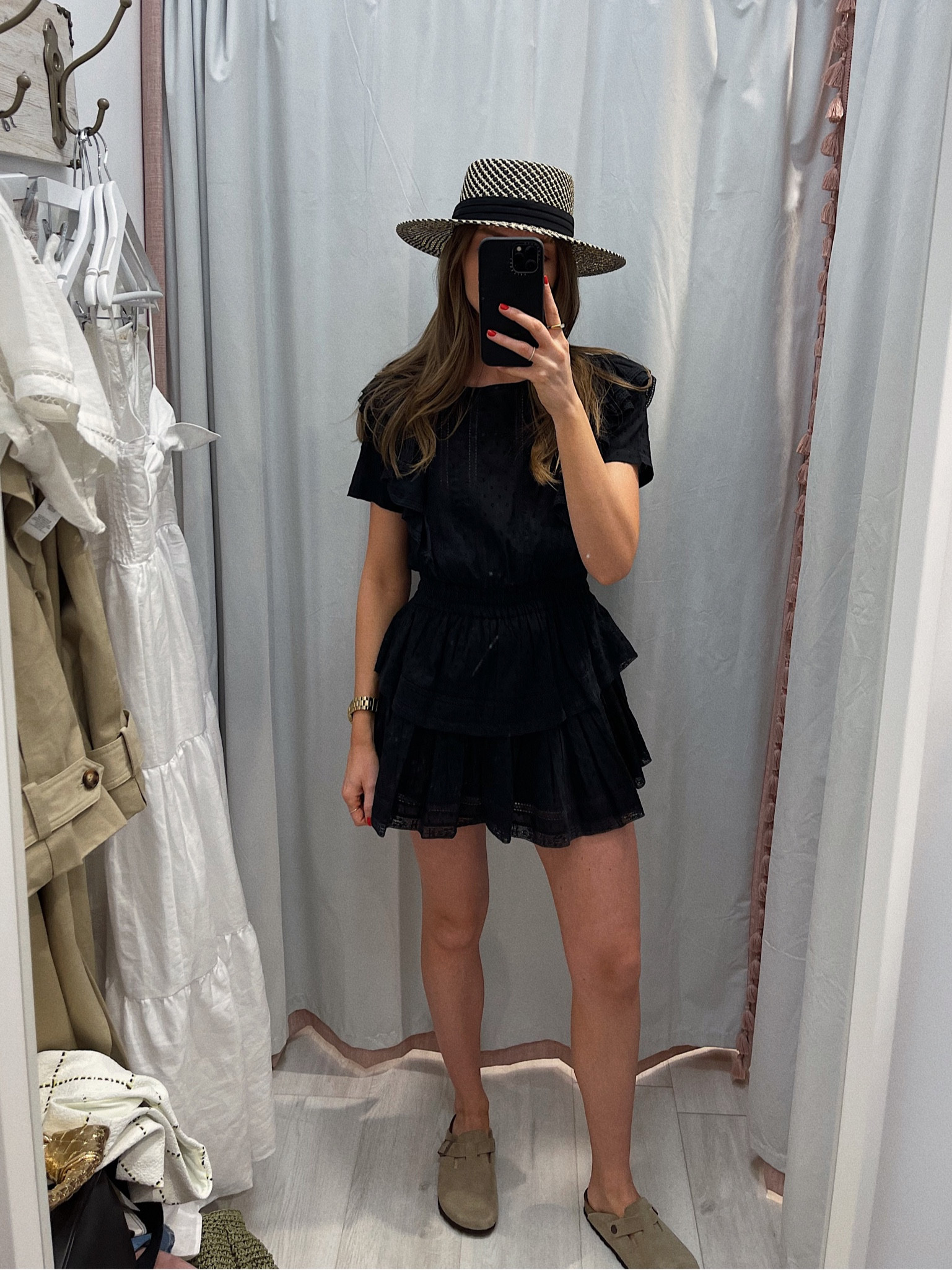 Wearing the loveshackfancy Natasha black mini dress 
EM15 for 15% off the OutDazl website 