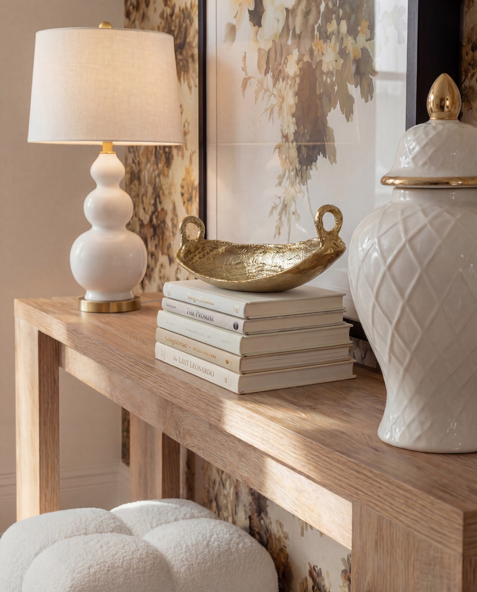 ✨ Shop the Look
Light wood console table | White boucle pouf stools | Sculptural white table lamp | Gold accent decor bowl | Large floral framed artwork | Neutral patterned hallway runner | Warm floral wallpaper | Brass globe sconces

#LTKSaleAlert #LTKHome #LTKFindsUnder100
