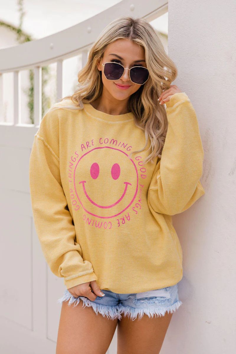 Good Things Are Coming Smiley Gold Graphic Sweatshirt | The Pink Lily Boutique