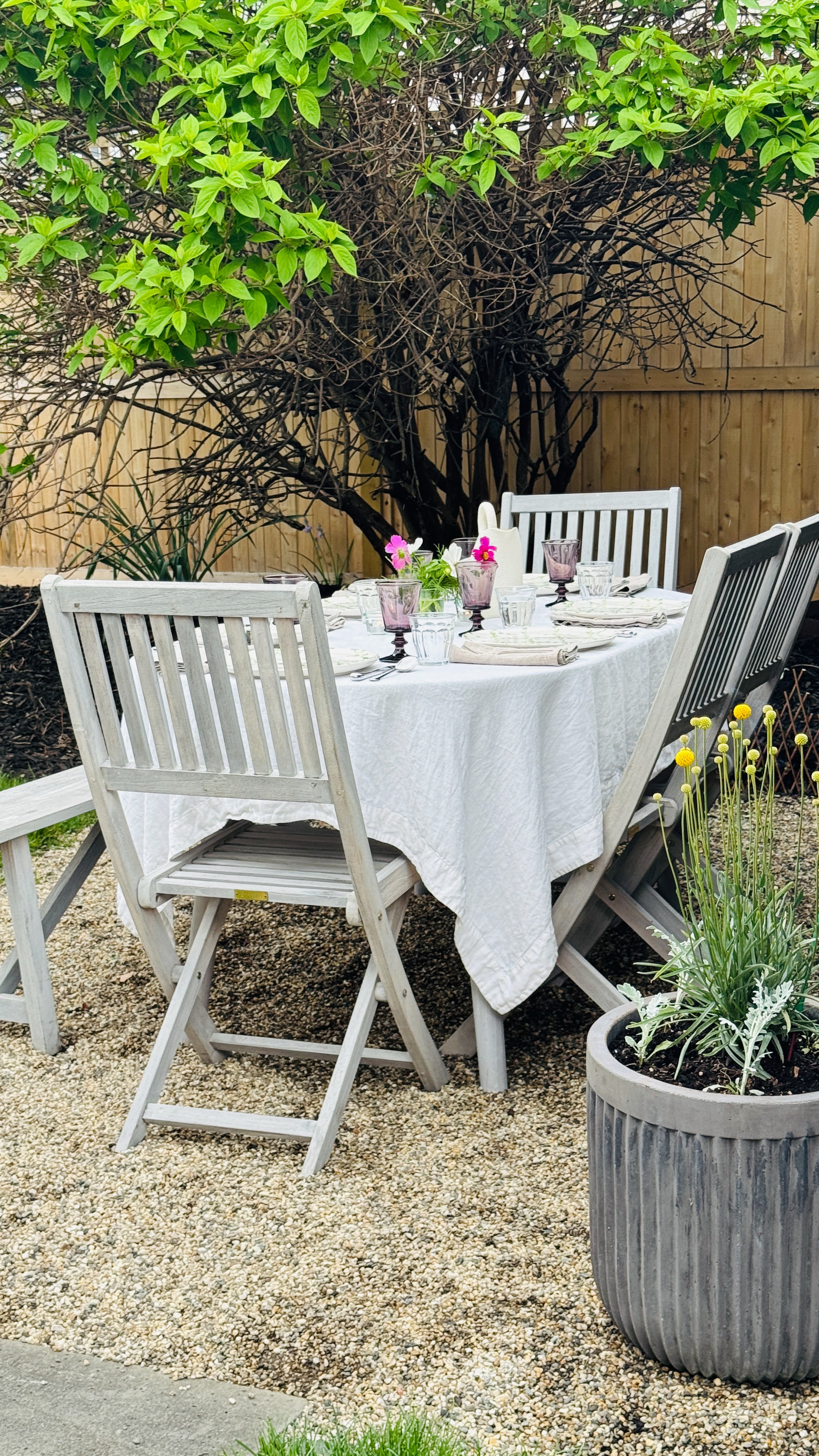 I’m thrilled to officially partner with Terrain to spruce up our garden and outdoor spaces for spring. We added Zinc Hayrack window boxes in two areas. They look beautiful, and they provide a little extra garden space in a small yard. We also added some pretty willow fencing for a simple border around the pea gravel. We love using citronella sticks in all the planters. They smell good and keep the bugs at bay whether you’re gardening, or entertaining outdoors. How cute is the aged-iron star wreath? I’ll probably be moving this to the front door for memorial day and the fourth! Comment SPRING for a link to all the pretty things from Terrain! 
@shopterrain #shopterrain #terrainpartner