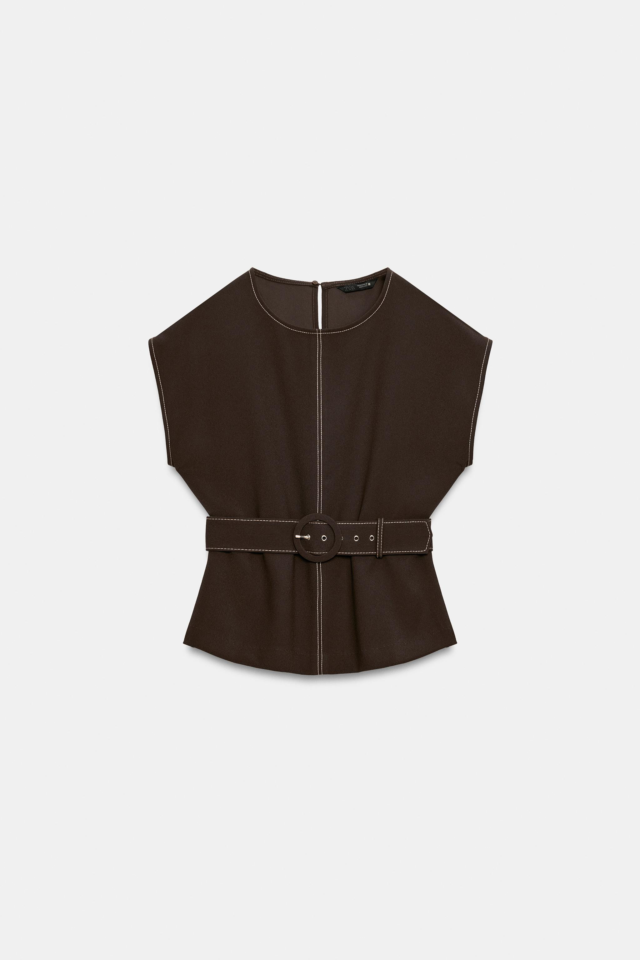 Round-neck, short-sleeve top. Features contrasting belt detail and topstitching. Back closure wit... | Zara US