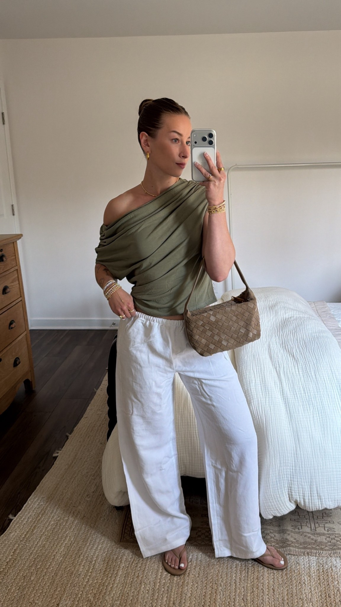 3/31/26 Casual Spring Outfit

An easy spring-to-summer outfit 🤍 Wearing my Aritzia linen pants (size S) with my green Free People one-shoulder top — such a flattering, elevated basic.

Paired with my TKEES nude flip-flops (the best neutral pair that goes with everything), my Celine sunglasses, and my Amazon suede woven bag.

Simple, effortless, and perfect for warmer days. Everything is linked here ✨

#LTKSeasonal #LTKootd