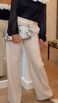 The Cambridge Tailored Wide Leg Pant in Beige are a smart, tailored style with an elegant wide leg and pintuck detail. High-waisted with belt loops for styling, they’re perfect for dressing up for the office or dressing down for evenings out. And, designed with an extra-long length, they can be shortened to create the perfect fit that lets you slip on both sandals and stiletto heels. We make each style in our studios in Europe with a soft crepe fabric that's easy to wash and wear.
Fits true to size. Other colors available. Wear all year long
Handbag trending reptile and trending shape 
Dressy pants, tailored trousers

#LTKOver40 #LTKootd #LTKWorkwear