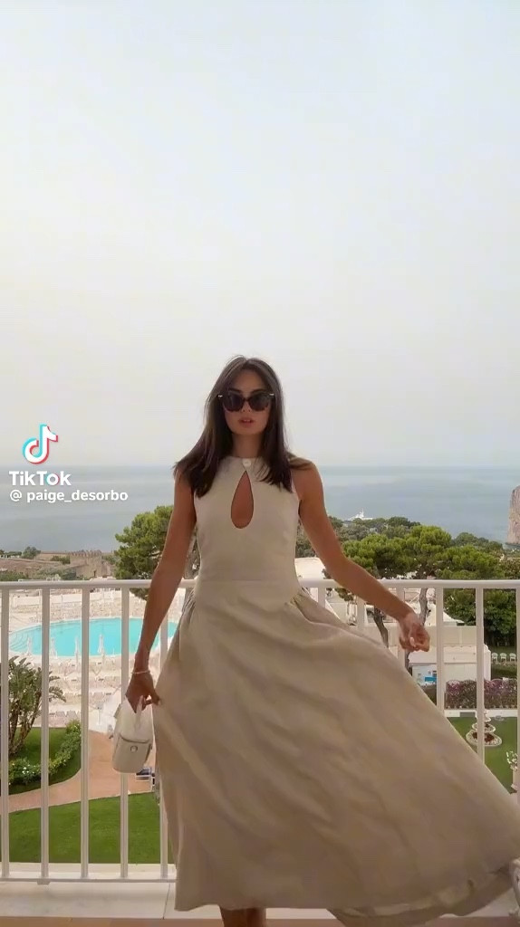 The beautiful iconic Paige Desorbo wearing the dress of the summer  