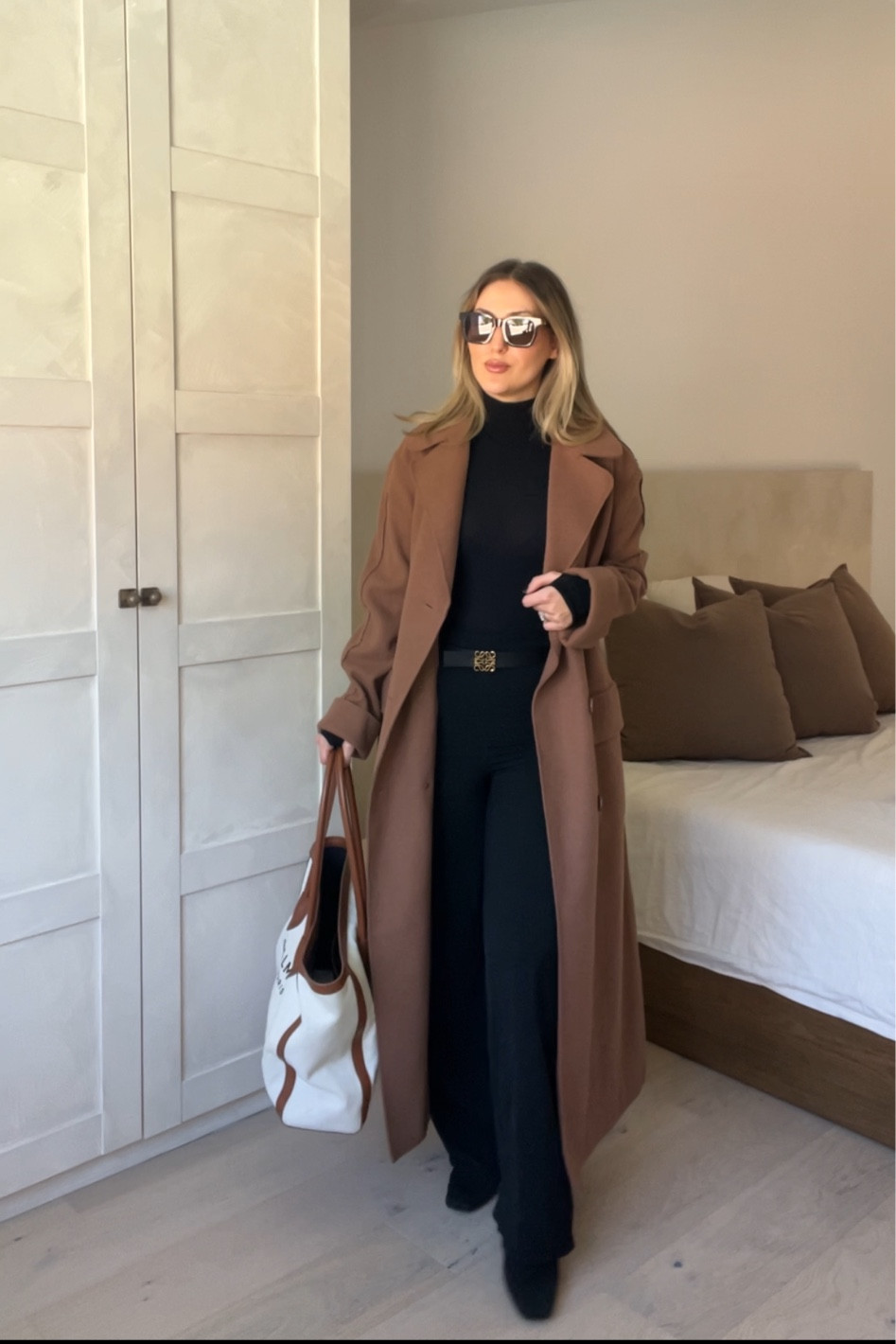 Sunglasses @teuxofficial Daybreak in coffee & crème 
Long coat - size XS, it’s already oversized so don’t go bigger 
Turtleneck bodysuit - one size fits all 
Loewe reversible belt 
Balmain tote handbag 
Comfortable ankle boots - TTS 
Black pants 

Fall fashion 
Office outfit
Fall outfits 
Chic work outfit 
Winter outfits 
Chic travel outfit 
Boots 


#LTKShoeCrush #LTKTravel #LTKWorkwear