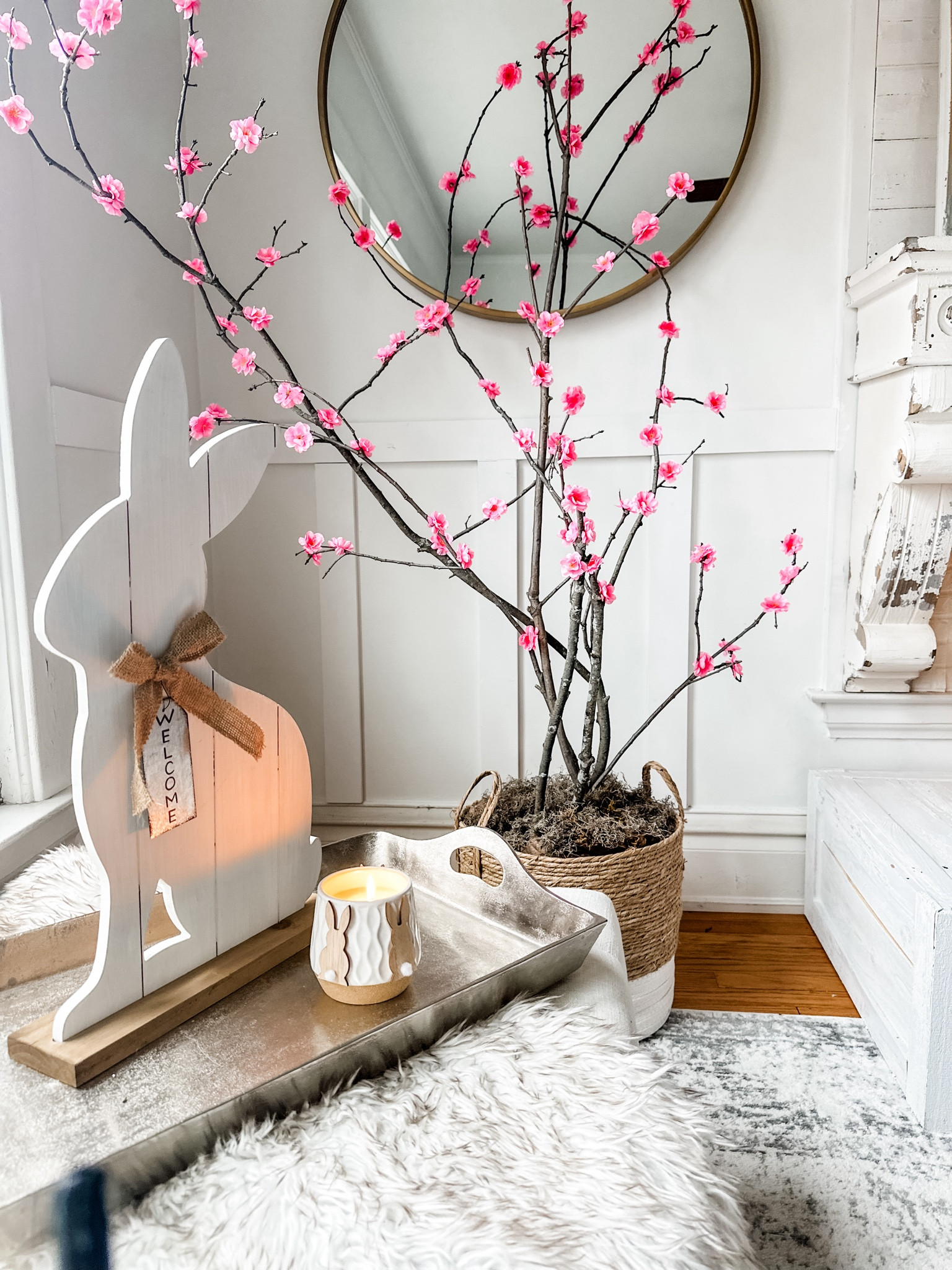 Nothing says Spring is here like a cherry blossom tree!! Our DIY cherry 🍒 blossom 🌸 tree is so easily to make! Just add some gorilla hot glue (our fav brand) with these Amazon cherry blossoms and voila!! Finish the look with this white farmhouse bunny from At Home to make a perfect Spring/Easter cozy corner!!
