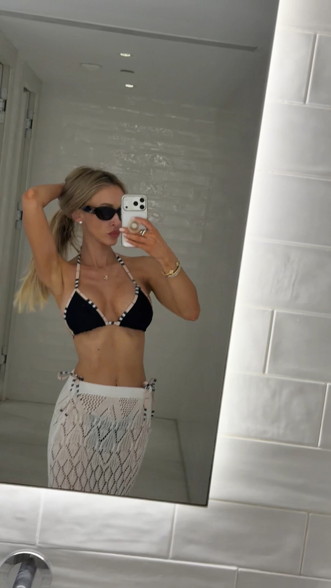 Designer dupe on Amazon! Gold diamond butterfly pendant necklace. Diamond stud earrings. Chanel classic tortoise sunglasses 

Burberry inspired black bikini plaid trim black bikini white crochet high slit maxi skirt beach cover up 
Summer travel 
European summer

#LTKSwim #LTKTravel #LTKSaleAlert
