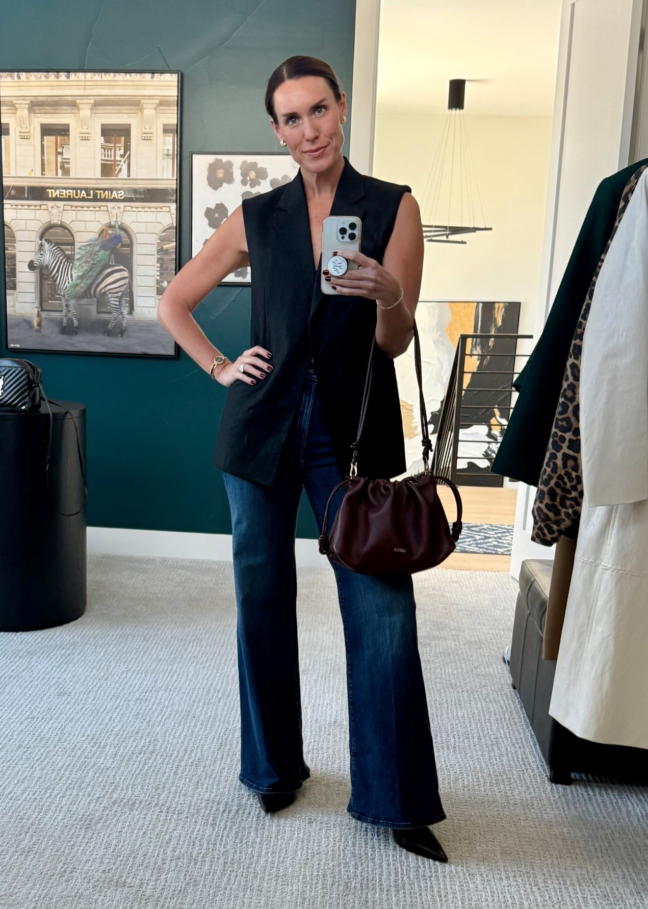 Mid work-week outfit for another beautiful, warm October day. 🍂☀️longline blazer vest, trouser jeans, black boots, statement purse. Polished with gold accessories. 
