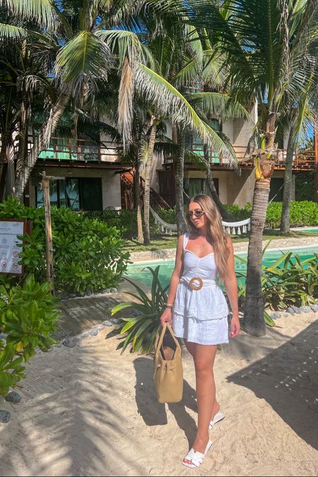 White beach dress. 
White beach sandals. Celine sunniest Celine sunglasses. 