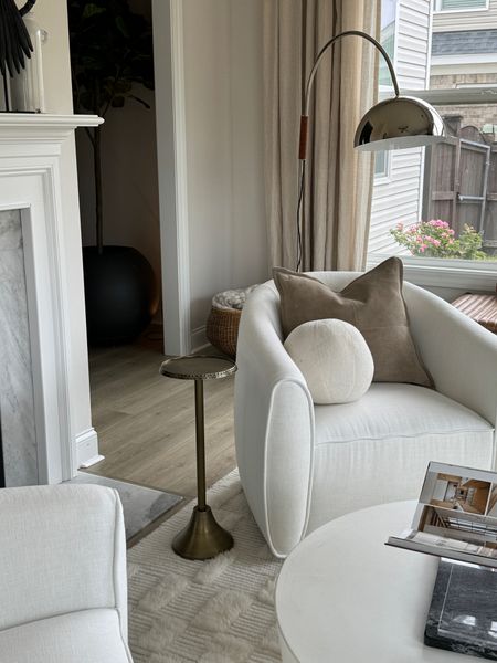 A still image of the sunroom with our new side table! I love it!

Side table, barrel, chairs, neutral, white accent, chairs, coffee, table, mantle, decor, floor, lamp, sunroom, living room, bench, home decor 

#LTKfindsunder100 #LTKstyletip #LTKhome
