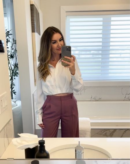 Into this cute fall outfit 😍
I’m a small in the cropped button up shirt and have it in both black and white. These pants are perfect for fall and love the rose tone 🙌🏻 (though these pleated pants come in 3 colors) 
Linking both 🇨🇦 and 🇺🇸 #pants #falloutfit #widepants #worklook #dresspants #pleatedpants

#LTKSeasonal #LTKfindsunder100 #LTKworkwear