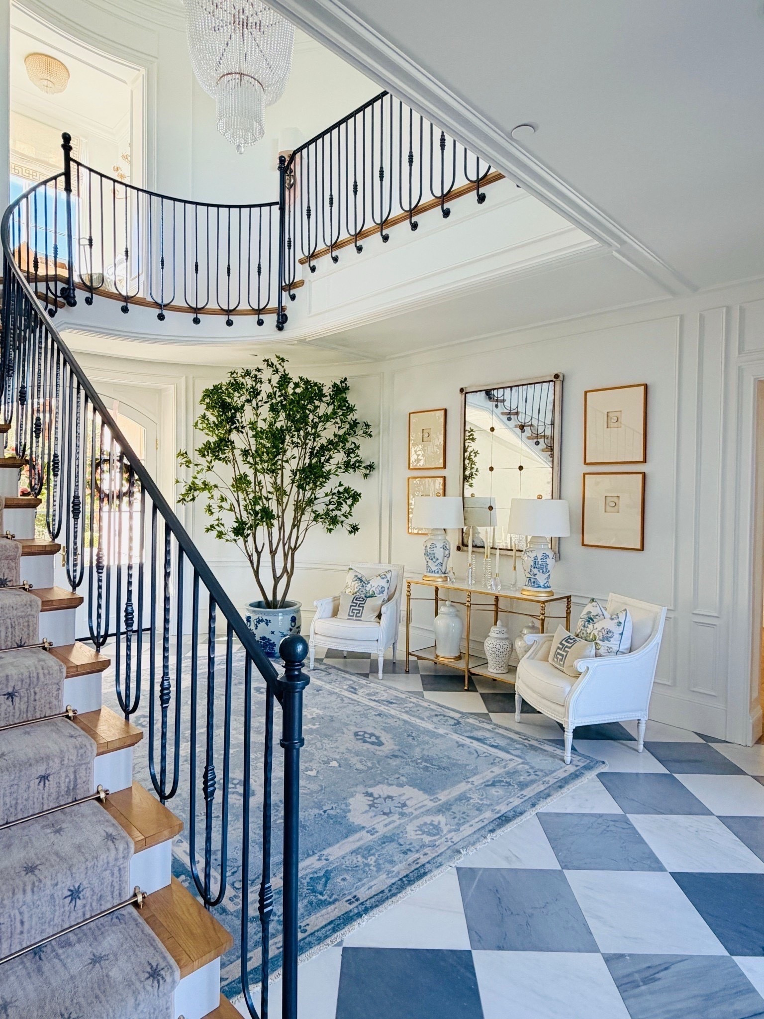 The most gorgeous faux tree! It is 9.5’ tall (there is an 8’ option as well) and looks so real! We placed our’s inside this beautiful chinoiserie planter (the largest size).

#LTKHome