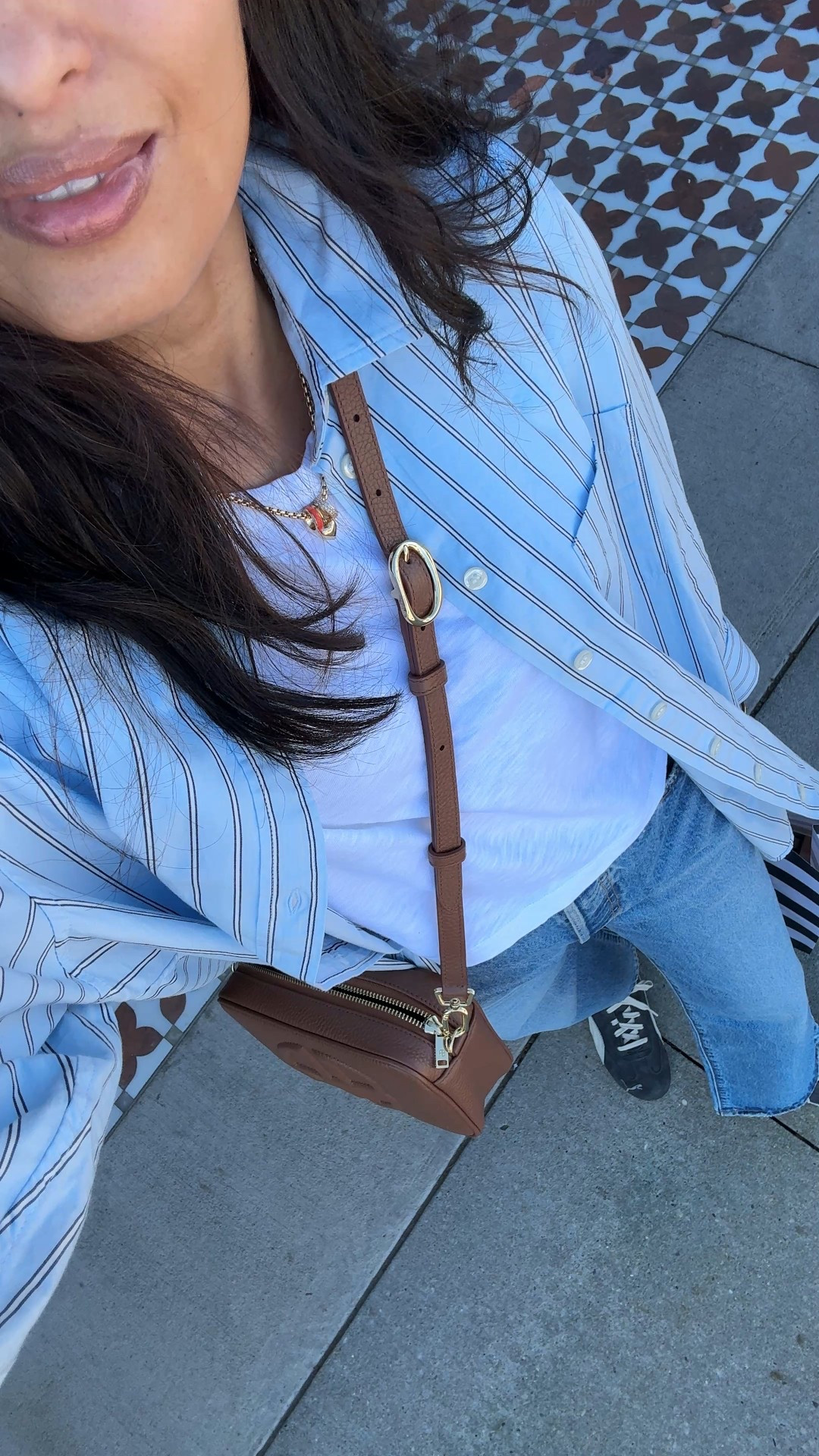 Easy everyday Fall layered look: shirt as a jacket. 
I haven’t pulled out a real jacket yet and have been layering up in the mornings with an oversized button down shirt instead. 
- This exact oversized button down has the best fit. Truly oversized in your true size and I love that. Long enough to cover for leggings too. Size down for a more classic fit. Multiple colors available. 
Currently on sale.
- Linking my current favorite options for good cotton t-shirts. 
- Favorite 90s relaxed straight leg jeans. I size up. 
- Suede sneakers in an eye catching washed gray color. Cool, vintage-vibe. Nice neutral with edge. Comfy fit. True to size. 
- Necklace that elevates a simple tee. 
- Classic leather crossbody bag in neutral brown. 
- Mixed metals bangle bracelets go casual to dressy. 
- The Rhode products come in beautiful shades. The lip products ended up drying out my lips, but I love the blush. I have shades tan line and toasted teddy  


#LTKStyleTip #LTKFindsUnder100 #LTKOver40