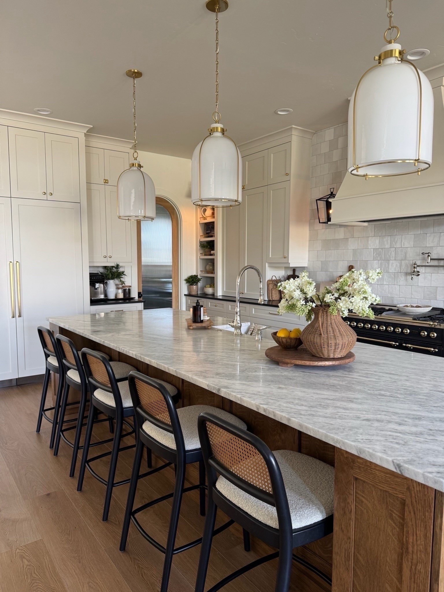 I haven’t shared these counter stools in a little bit! We have had them for about 2 years now and love them. They have been so great with three kids, and I appreciate the design—cane backing, upholstered seat, and sleek black frame! 

#LTKHome