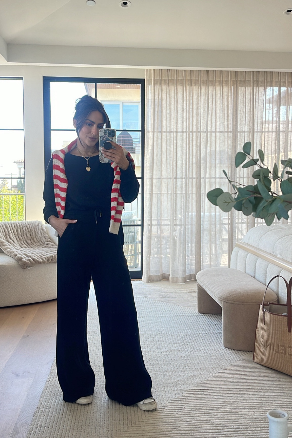 Airport attire. Use Spanx code amixspanx for 10% off wearing size s in sweater and jumpsuit 

#LTKTravel #LTKOver40 #LTKActive