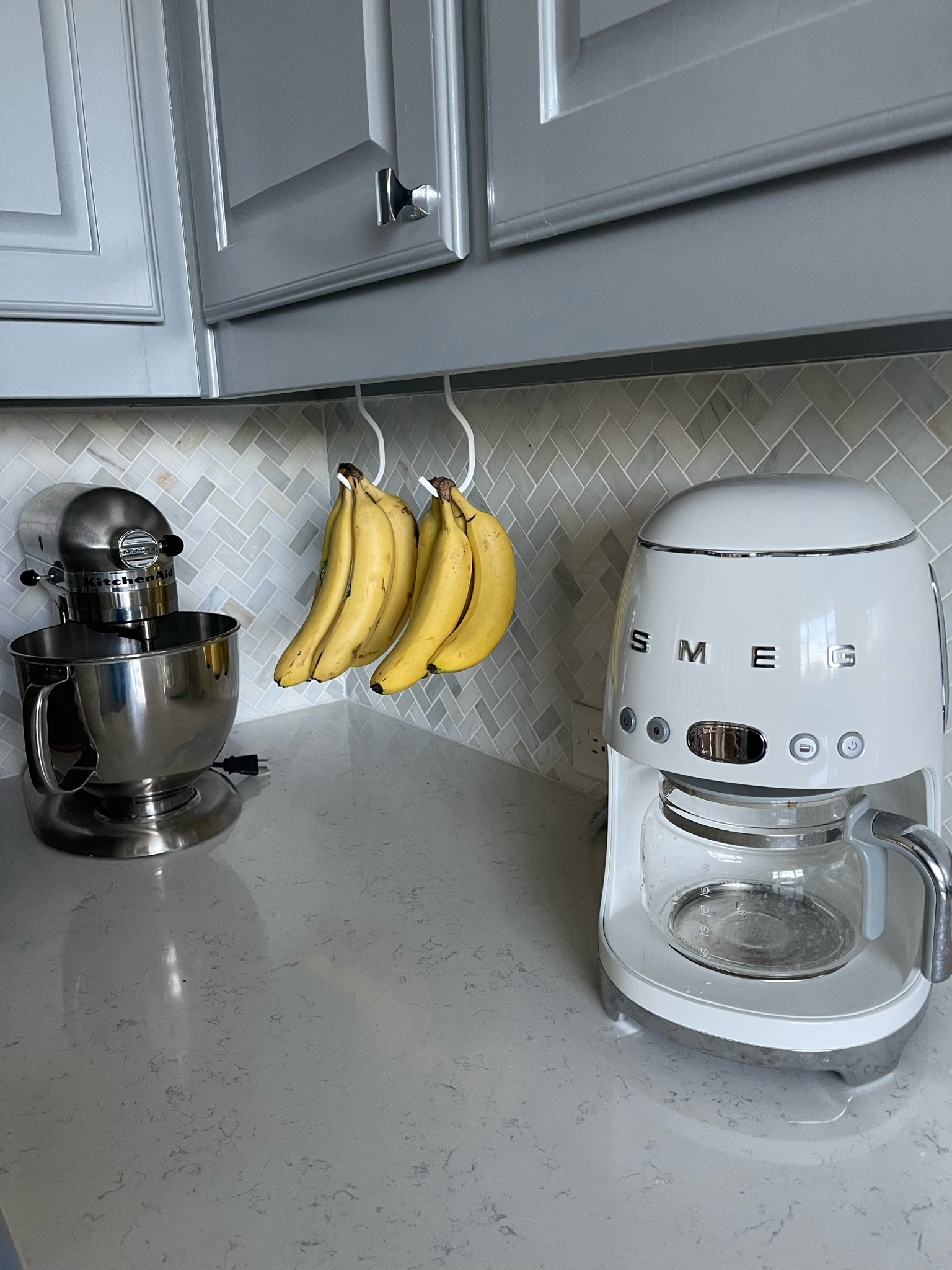 Banana holder that doesn’t take up space on your counter top! 

#LTKHome #LTKFamily