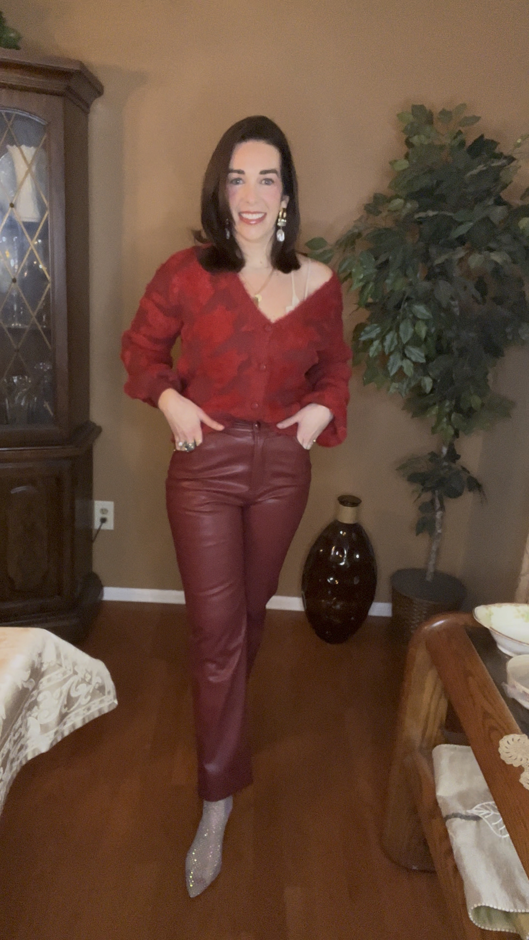 Red knit cardigan (extra small). 
Burgundy faux leather high waisted pants (small). Silver rhinestone sparkly heels (8.5). #cardigan #redcardigan #knitcardigan #fauxleatherpants #pants #burgundypants #highwaistedpants #heels #sparklyheels #rhinestoneheels #silverheels #valentinesdayoutfit #datenight 
Valentine’s Day Outfit 
Date Night 

#LTKStyleTip #LTKFindsUnder100 #LTKSeasonal