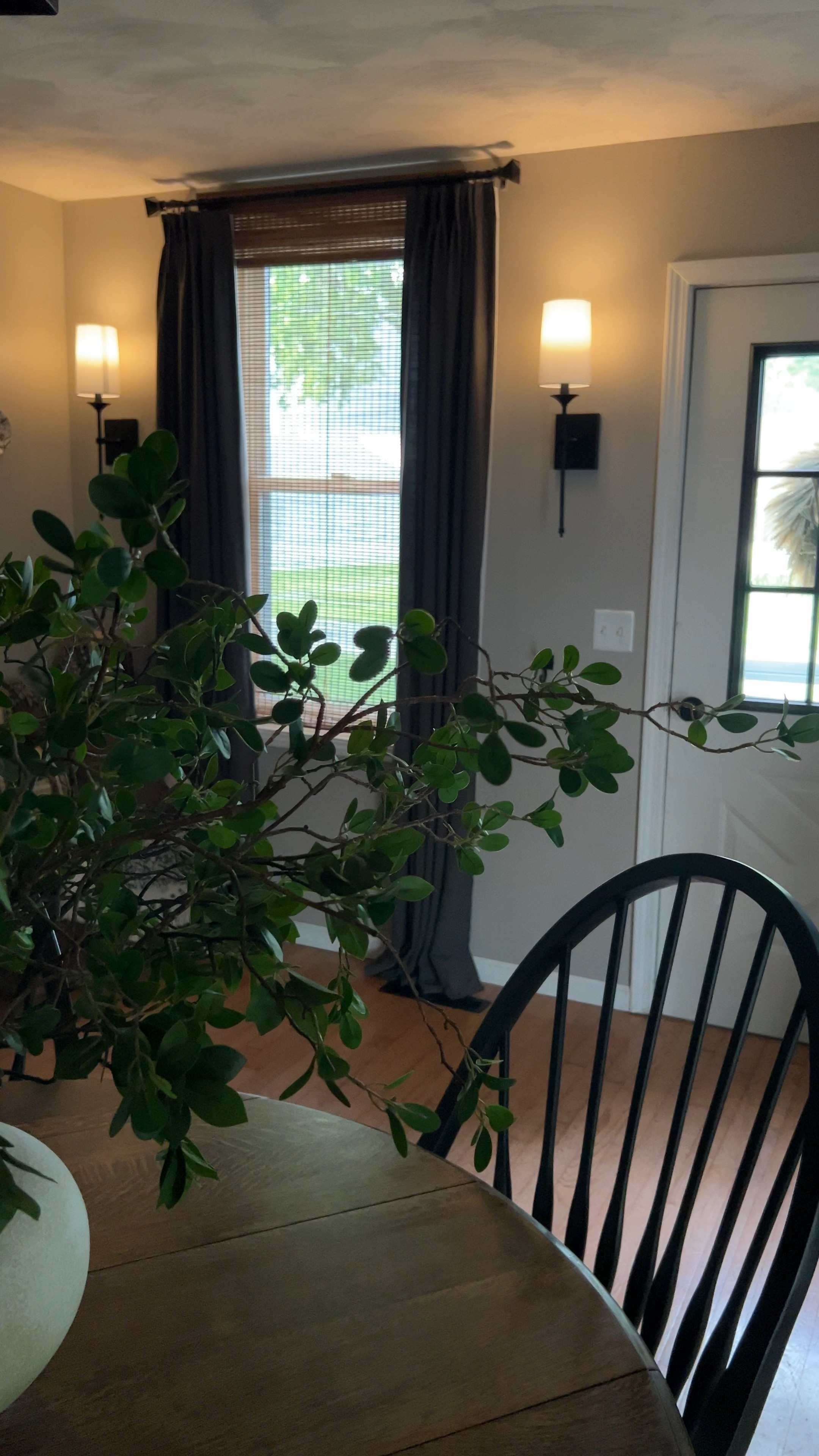 Affordable Sconce Accent Lighting.

For more kitchen & dining views (during the day) check out my Kitchen/Dining Collection in my LTK shop!

Don’t forget to follow @elevatedneutrals on Pinterest, Instagram & Facebook for more home inspiration!

Rechargeable Light Bulbs | Remote Control | Dimmable | Warm White | Color Changing | Transitional Dining Room | Moody Dining Room | Modern Farmhouse | Traditional Design | Vintage Rug | Round Dining Table | Vintage Plate Wall | Antique Plate Display | Brown Transferware | Dark Gray Curtains | Wooden Blinds | Woven Wood Shades | Curved Church Pew | Antique Church Pew | | Black Modern Dining Chairs | Windsor Dining Chairs | Ruggable Rug | Kamran Coral Rug |

#LTKHome #LTKVideo