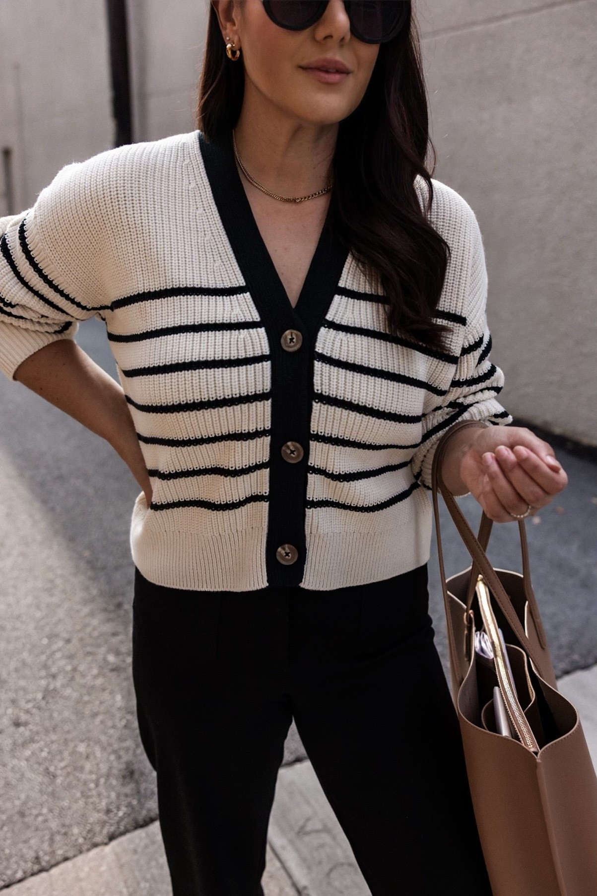 I am in the large of the cardigan, runs big so size down if in between sizes. I am in the 10 of the pants, runs TTS with stretch. I am in my typical size of the flats, run TTS.