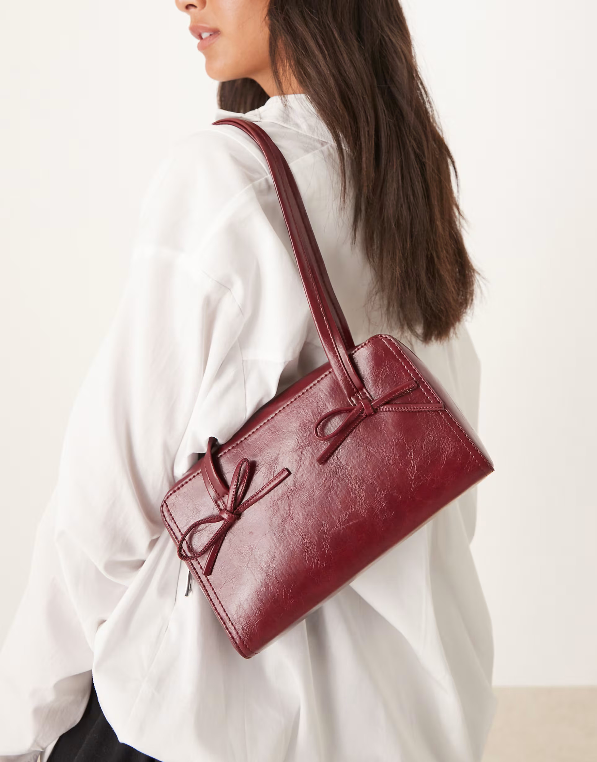 ASOS DESIGN boxy shoulder bag with bows in burgundy | ASOS (Global)
