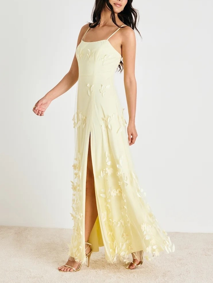 The airy floral print and playful appliqués create a breezy, feminine look perfect for vacations, brunch dates, warm-weather getaways, and weddings. Under $130.

Keywords:

* floral maxi dress
* floral appliqué maxi dress
* summer dresses women 
* date night outfits 
* garden party maxi dress 
* yellow floral dress
* feminine summer dress
* romantic mini dress
* vacation mini dress
* garden party dress
* wedding guest dress
* European summer outfit
* brunch outfit inspiration

#LTKgrwm #LTKootd #LTKWedding