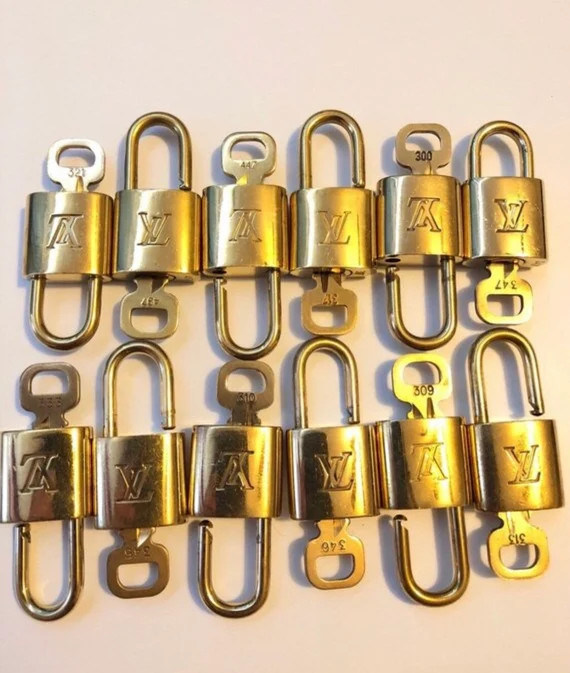 Authentic Louis Vuitton lock and key set. Authentic and  Vintage | Etsy (US)