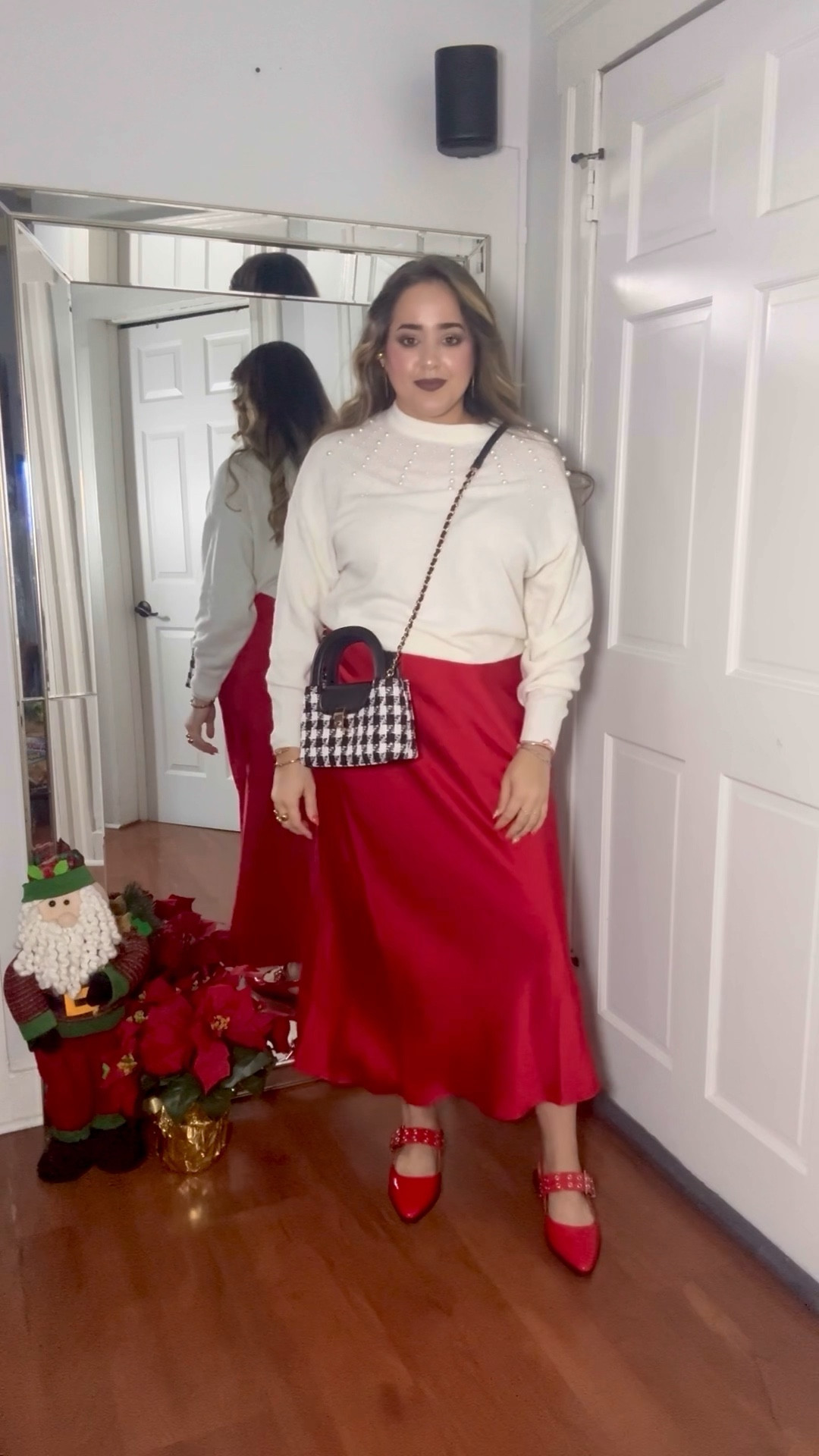 This red satin skirt from @Target was love at first sight. I paired it with this white sweater with pearls from @H&M. This makes such a great Holiday outfit. 

#LTKHoliday #LTKGiftGuide #LTKStyleTip