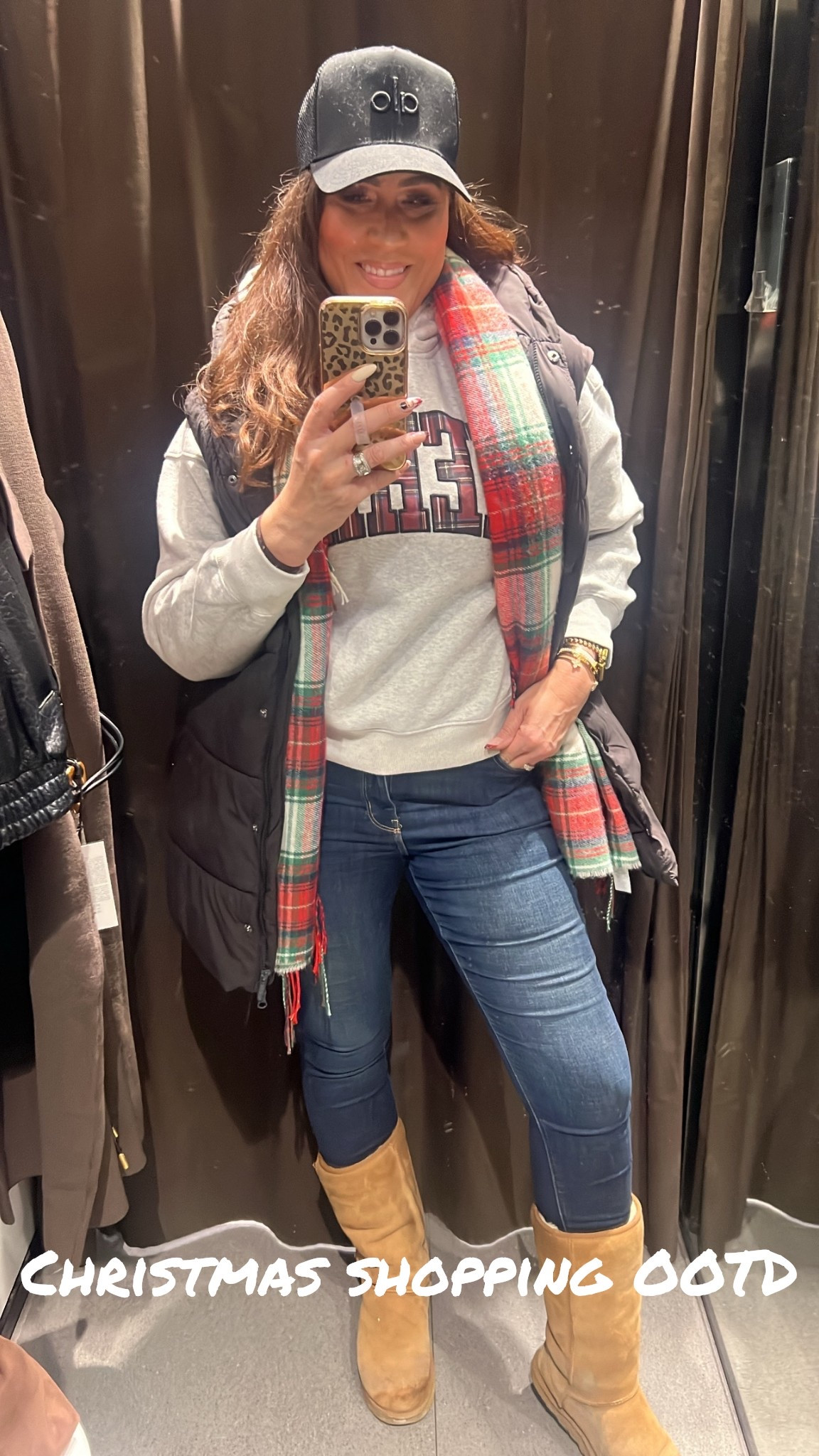 Christmas shopping OOTD, Christmas scarf, long hooded puffer vest, skinny jeans, UGG boots, trucker hat, gifts for her #LaidbackLuxeLife

Puffer vest: S
Sweatshirt: S (sadly sold out)
Skinny jeans: 8 Long
Boots: Run TTS

Hey Beautiful! Feel free to comment on this post if you have any questions! 🫶🏽

Follow me for more fashion finds, beauty faves, lifestyle, home decor, sales and more! So glad you’re here!! XO, Karma

#LTKGiftGuide #LTKootd #LTKHoliday