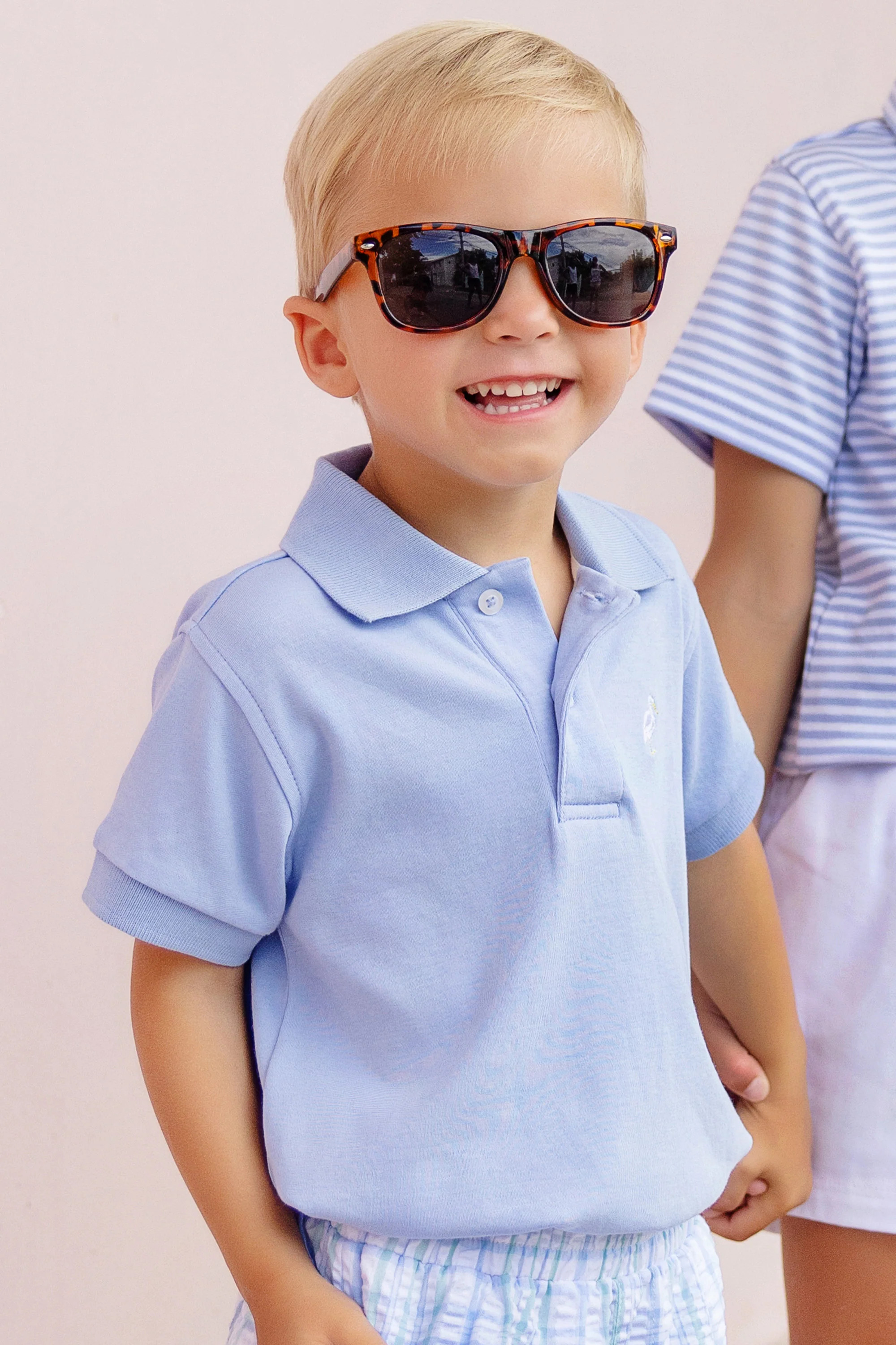 Prim & Proper Polo & Onesie - Beale Street Blue with Multicolor Stork | The Beaufort Bonnet Company