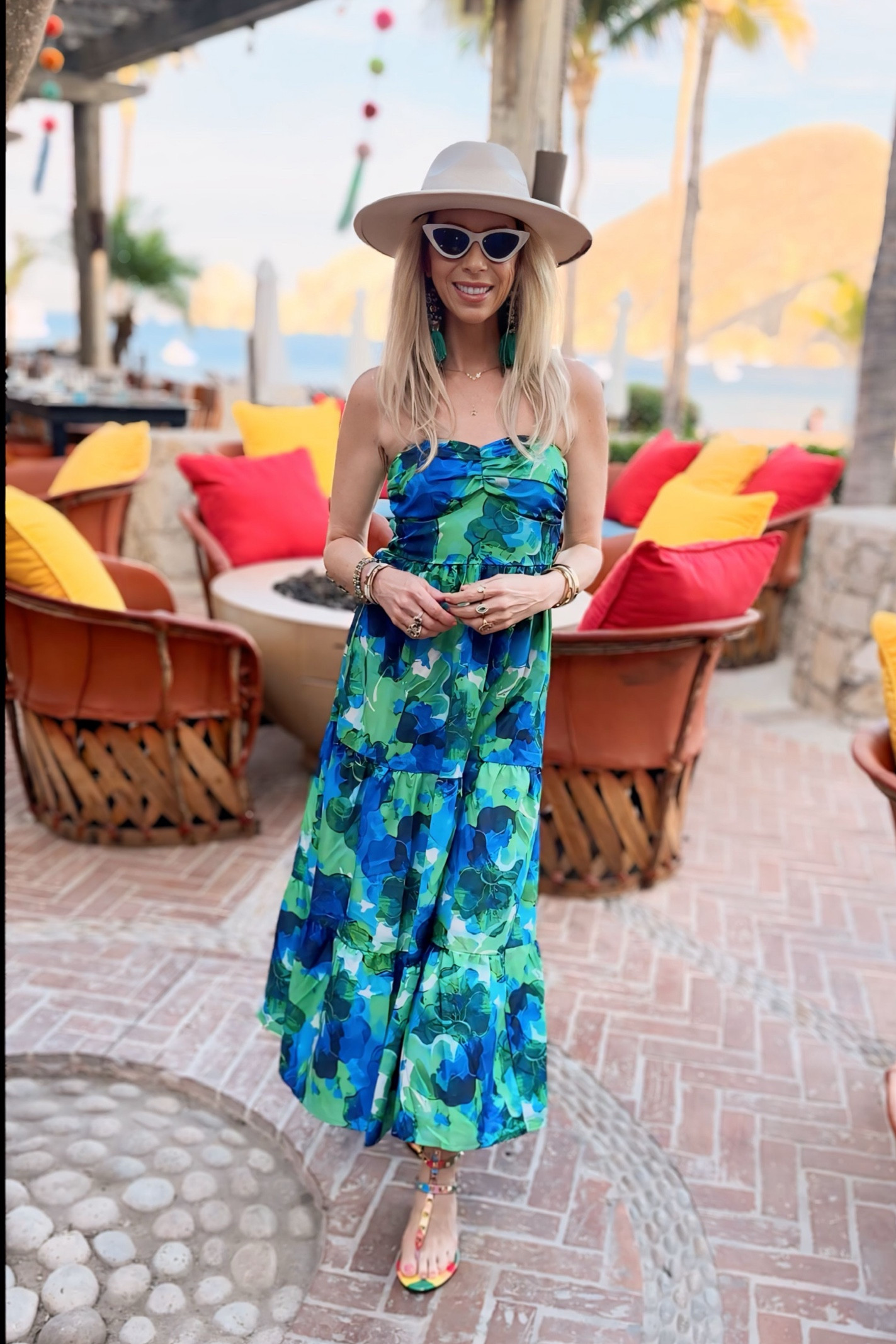 Love this strapless dress. Blue and green tropical print. Vacation, beach, travel and brunch perfect

#LTKSummerSales #LTKFindsUnder50 #LTKOver40