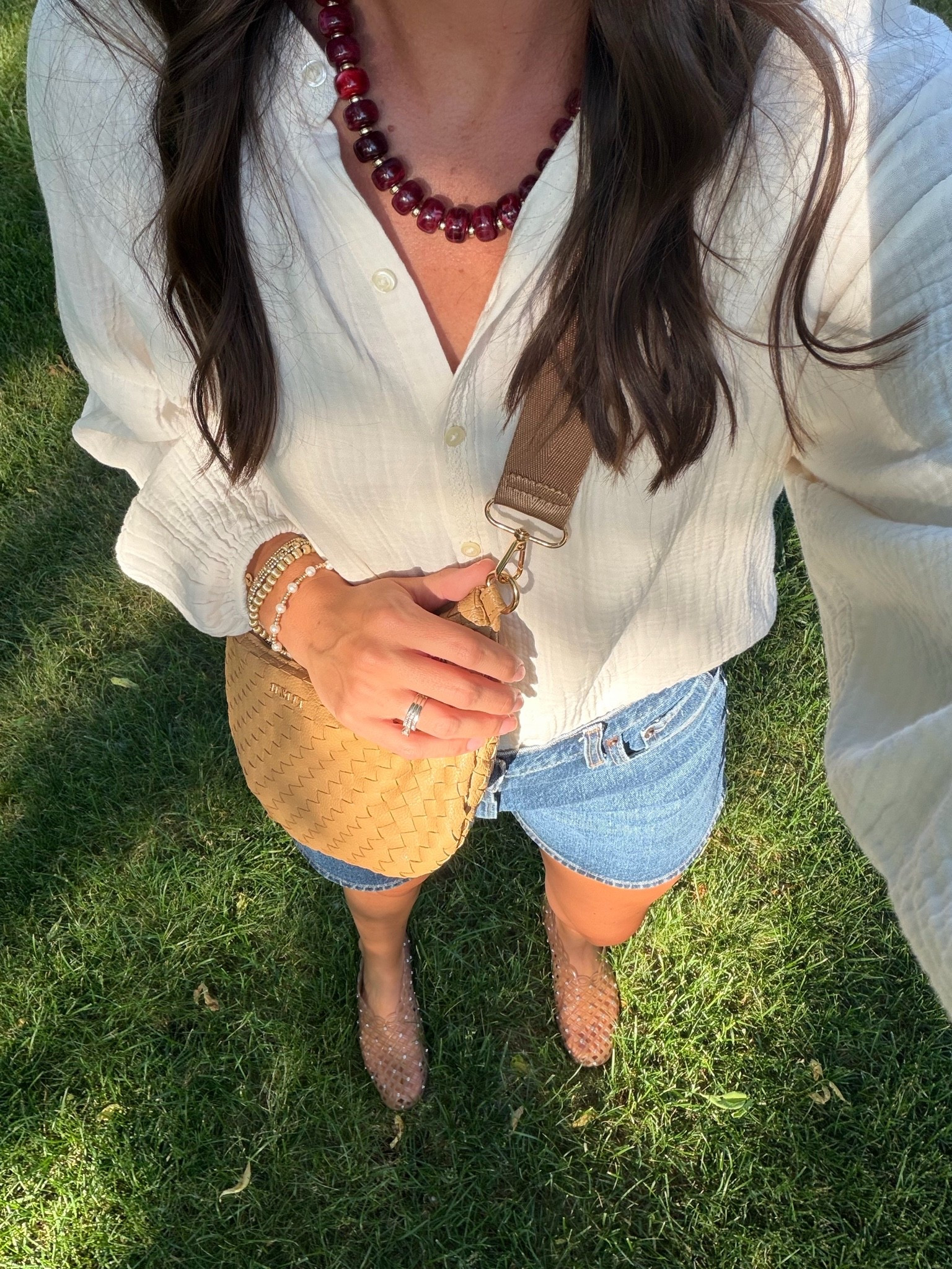 Absolutely love this gauze top for summer. Lightweight but looks so classy and can be styled many different ways. Wearing a small.