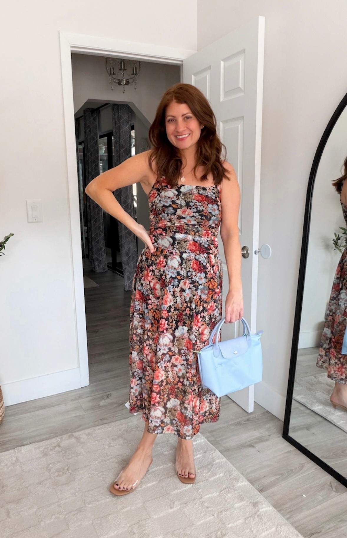 This floral dress is absolutely stunning for Easter, a spring wedding, fancy date night or any event where you need to dress up. I love the light blue on this handbag and the clear sandals to complete the look. 
Affordable wedding guest dress, floral Amazon dress 

#LTKSeasonal #LTKPetite #LTKOver40