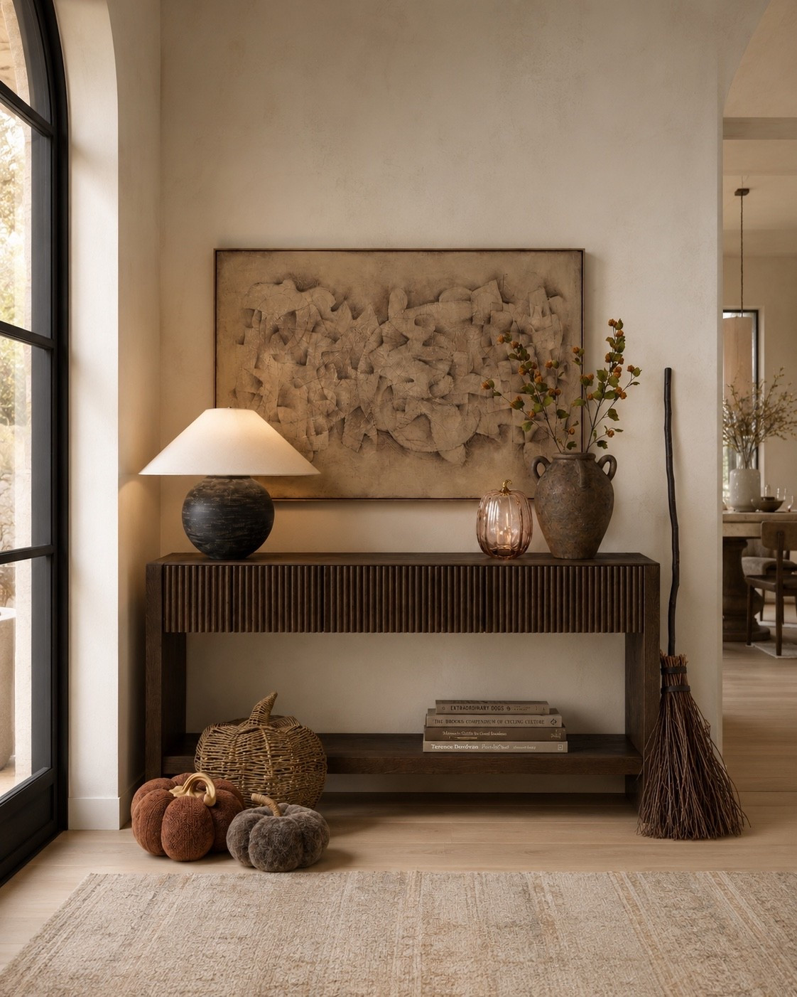Easy fall entryway inspiration! Add a few decorative objects such as pumpkins, layer in some seasonal stems, and lean into the warm neutral tones for a space that’s minimal yet perfect for fall.

#LTKHome