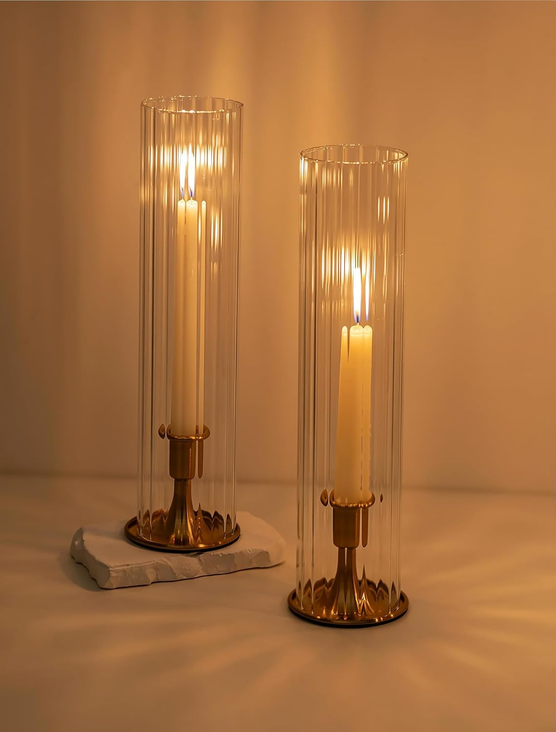 Romadedi Hurricane Glass Candle Holder: Set of 2 Gold Taper Candle Sticks Holder with Ribbed Cylinder Cover & Weighted Base for Coffee Table Centerpiece Christmas Wedding Outdoor Decor | Amazon (US)