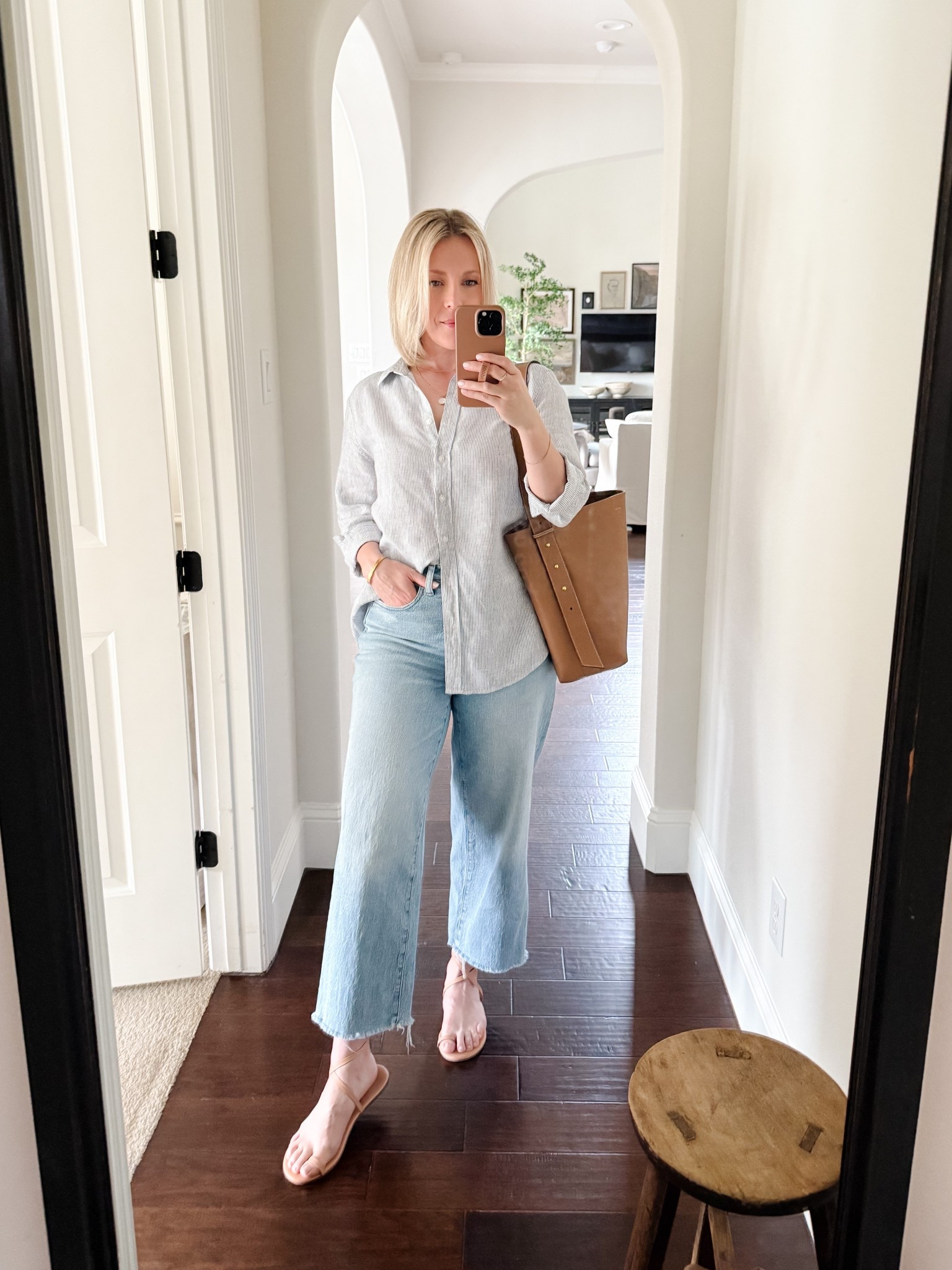 Stripe linen button up, wide leg jeans, nude sandals, and my favorite tan leather tote

Spring outfit inspo



#LTKHome #LTKOver40 #LTKMidsize