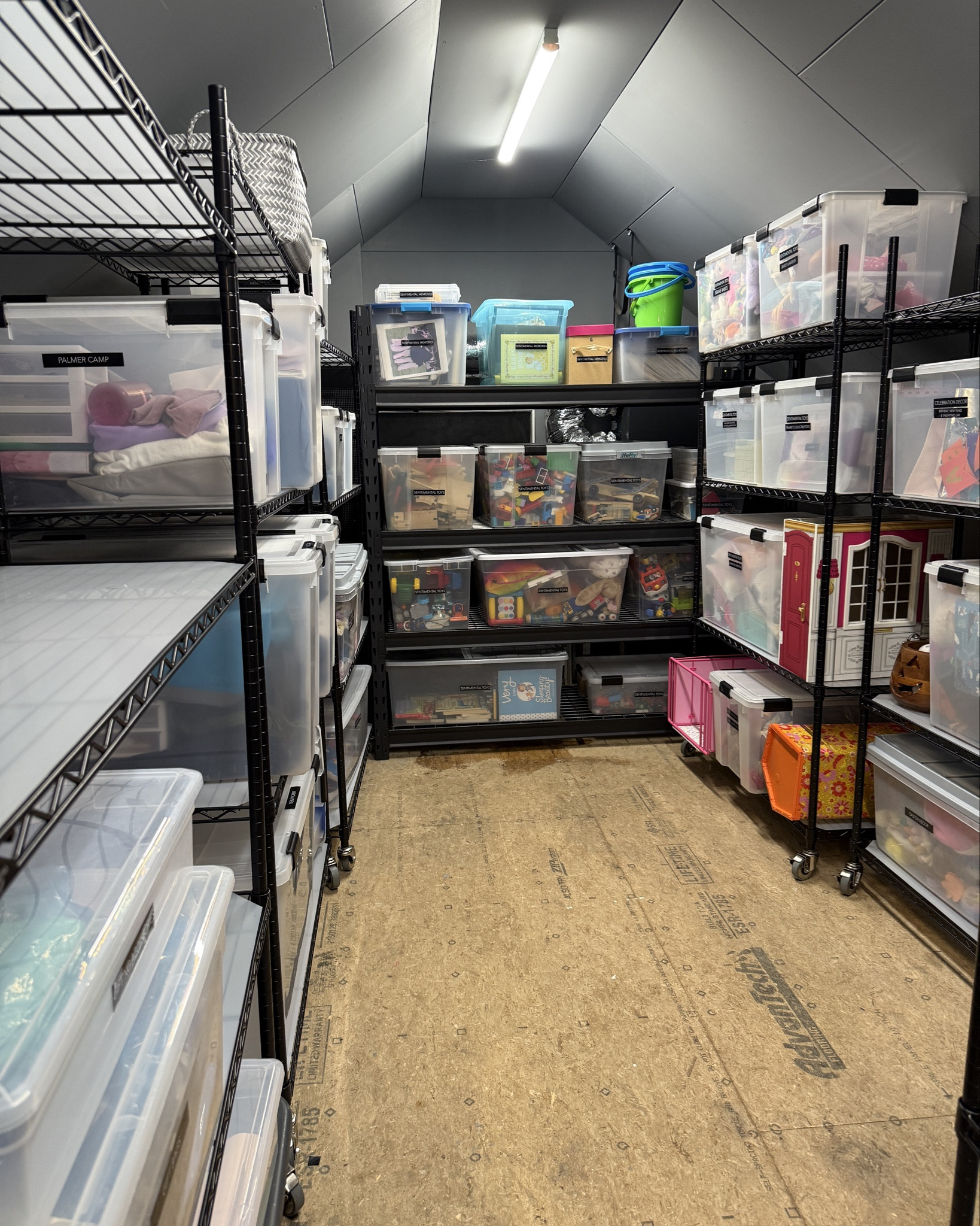 STORAGE ORGANIZATION - the best, easy to build storage racks. And the perfect weathertight bins for your most cherished memories  

#LTKHome #LTKHoliday #LTKFamily