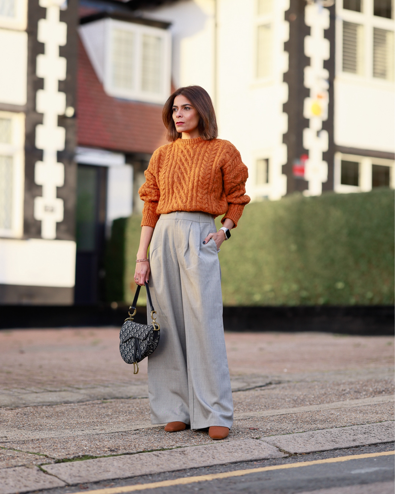 brown sweater gray pants