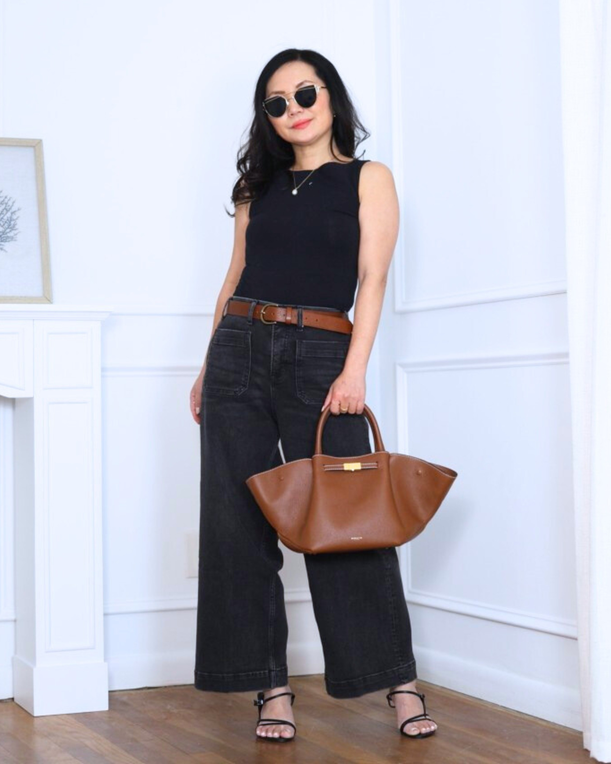 Black wide-leg jeans from Spanx paired with a sleek boatneck tank and strappy heels from Quince — simple, flattering, and effortlessly polished for day or night. I’m 5’2, wearing size XS.

#LTKPetite #LTKOver40 #LTKootd