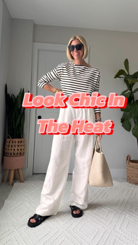 French Girl chic outfit for summer! Linen pants are amazing to keep you cool in the heat, plus they look, elegant and modern! I love them paired with a striped tea, comfy sandals, and woven tote bag

I am wearing my true to size 4 tall in these must have pants 

#LTKVideo #LTKFindsUnder100 #LTKOver40