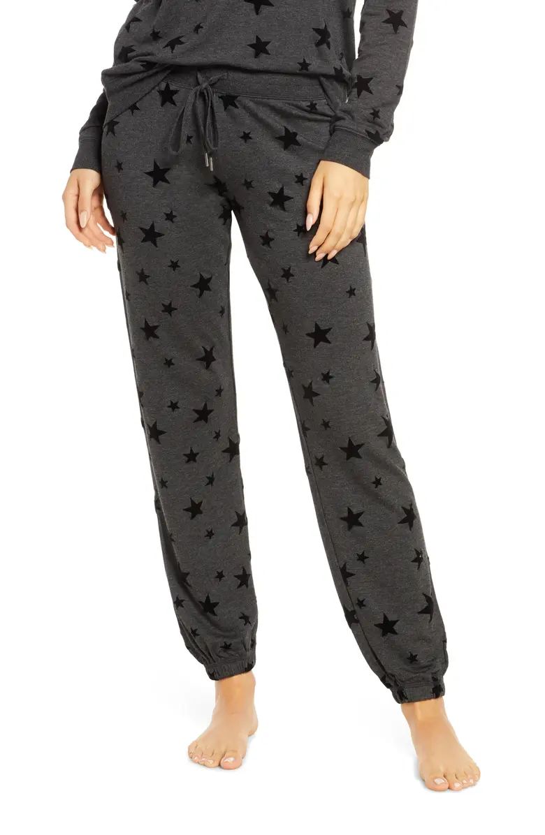 Lounge in laid-back style with these fleece joggers featuring a flocked star print. | Nordstrom