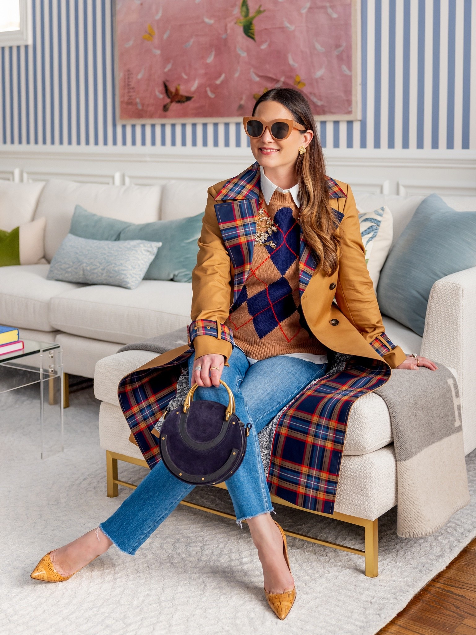 I absolutely love this trench coat and embellished sweater for fall. Also, these comfy jeans have been on repeat along with these chic and affordable sunglasses.