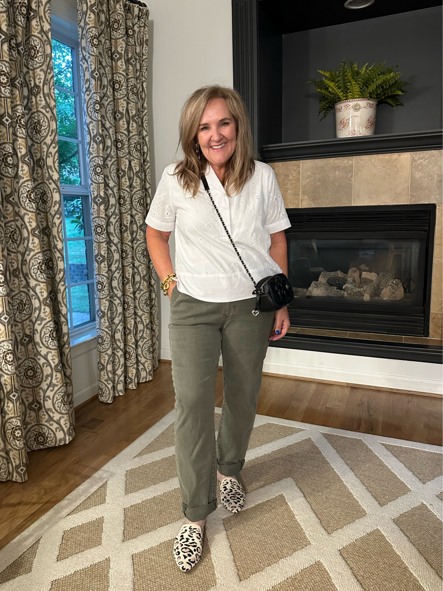 Love the pop of animal print in these slides. They’re comfortable for all day, but probably not miles of walking. I found them true to size.
My cotton pop over blouse is a staple, pretty eyelid details on the front. I am wearing a large.  I would consider sizing up if in between.
My pants, are a premium by Paige denim. I’ve had these for a year now and so glad I added them to my closet. Super soft and stretchy a staple in your wardrobe, depending on how slouchy you want them you can size down if you want them more fitted or go true to size if you want them relaxed .

Anthropologie, Amazon Brighton collectibles summer outfit animal print

#LTKMidsize #LTKShoeCrush #LTKOver40