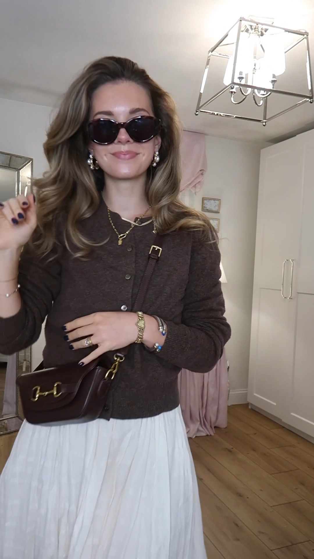 This cardigan was old navy last year - linked this years but they dont have the chocolate brown anymore! Also the dress is old free people, I believe it was called the “dreamweaver” but now when I look that up I can’t even find confirmation of that lol 

#LTKFindsUnder50 #LTKVideo #LTKFindsUnder100