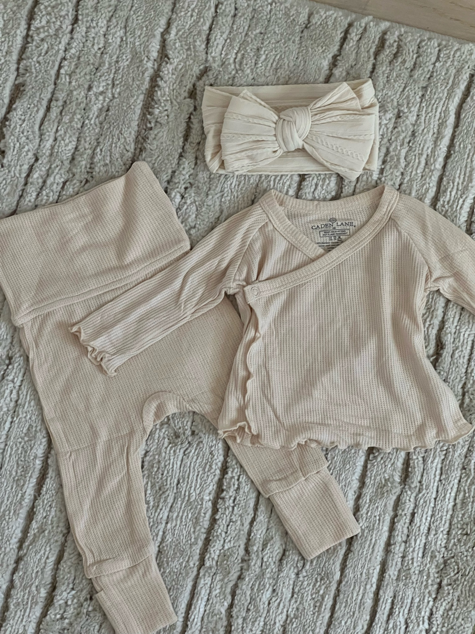 Our babies first going home from the hospital outfit!! I got it in the newborn size in almond! Bamboo waffled material. It’s the little frill details & fold over footies for me! 

Linking other favorites as well! 

Baby clothes 
Newborn clothes
Ruffled bamboo zipper bodysuit footie 
Personalized romper set 
Waffle top and bottom set 
Bamboo set 
Knit bow 
Knit Pom beanie 
Ruffled bow 
Knit ruffled blanket
Knit booties
Personalized baby hanger 
Newborn outfits 
Baby outfits 
Maternity 
Baby shower gift guide
Baby shower gift ideas 
Gifts for babies 



#LTKfindsunder50 #LTKbaby #LTKbump