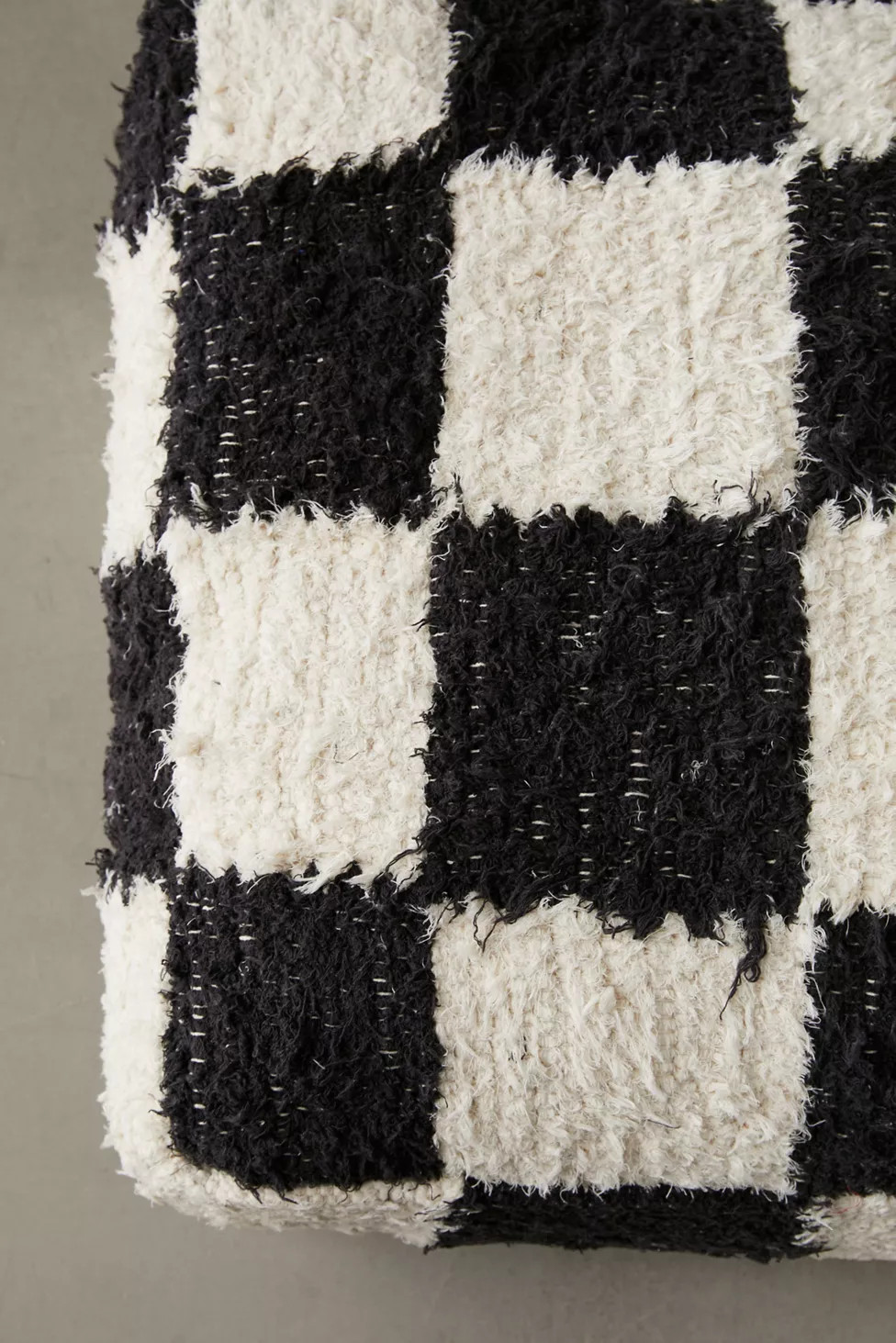 Checkerboard Shaggy Rag Floor Pillow | Urban Outfitters (US and RoW)