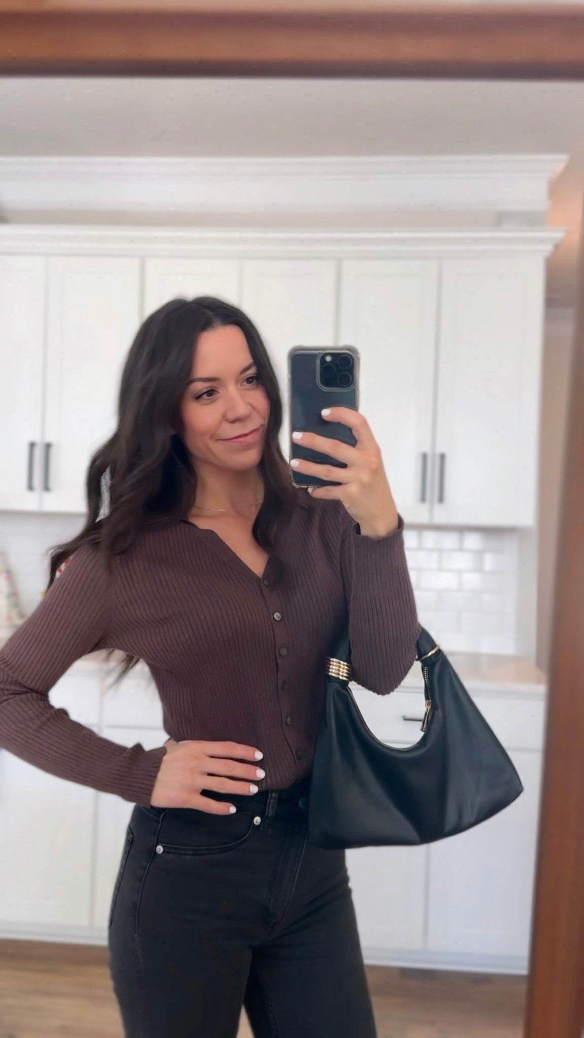 Outfit of the day. 🤎🖤 These black washed denim jeans are so perfectly stretchy and flattering for your waist! I’m obsessed!!!! 
Also this purse is the perfect size - never lose a thing in your bag again!
This is one of my favorite tops to grab, classy and that brown color that’s so trendy. 

#LTKmomlife #LTKSeasonal