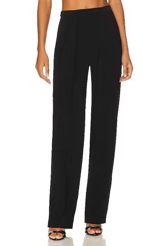 Norma Kamali Tapered Pleated Trouser in Black from Revolve.com | Revolve Clothing (Global)